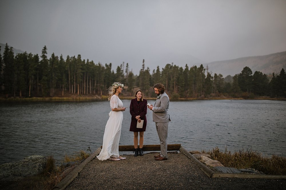 bride and groom vows, sprague lake dock elopement, sunrise elopement, colorado elopement, sprague lake elopement, rocky mountain national park elopement, adventurous colorado hiking elopement