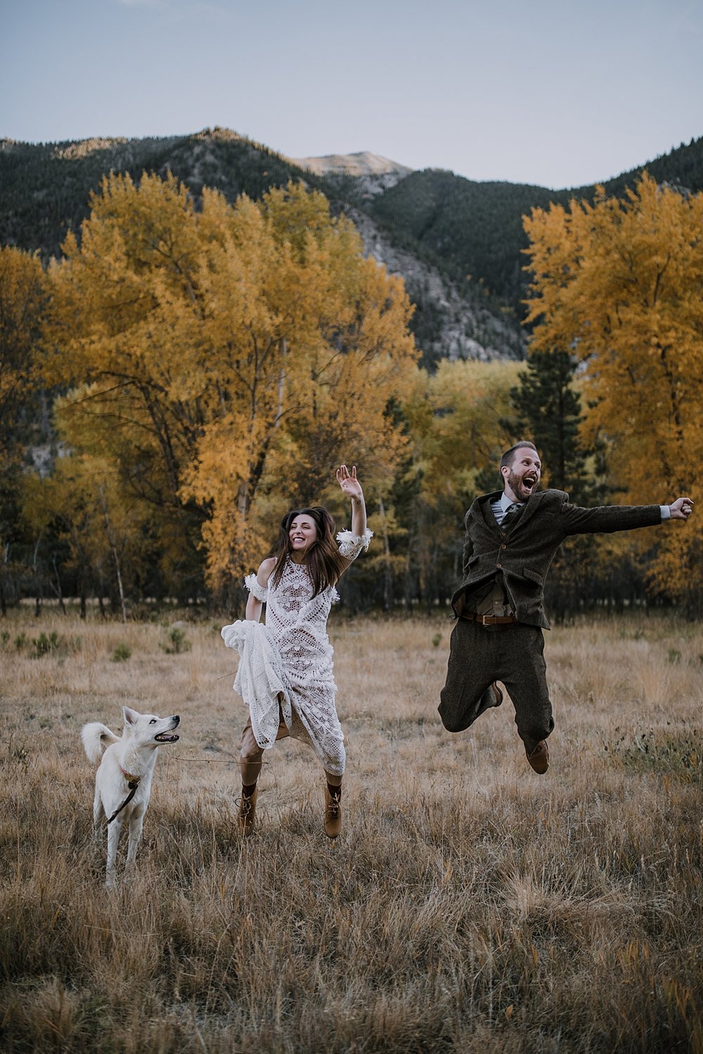 wedding couple jumping, weddings that include dogs, nathrop colorado elopement, bridal day after session, elopement celebration, nathrop colorado in the fall, fall hiking in nathrop