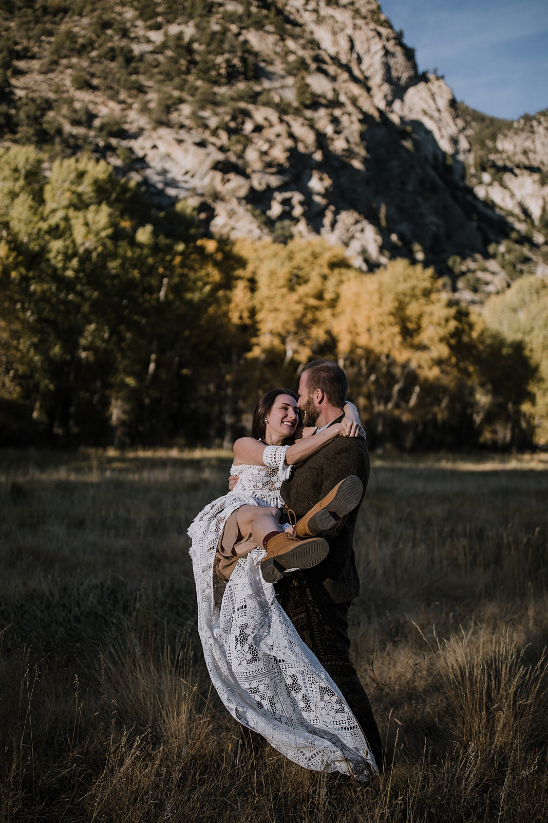 wedding couple jumping, weddings that include dogs, nathrop colorado elopement, bridal day after session, elopement celebration, nathrop colorado in the fall, fall hiking in nathrop