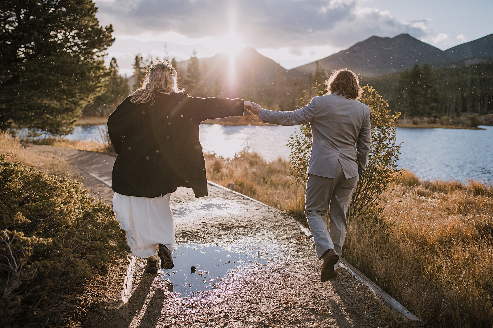 couple hiking in sun rain, rocky mountain national park elopement, self solemnize in rocky mountain national park, estes park elopement, sprague lake elopement