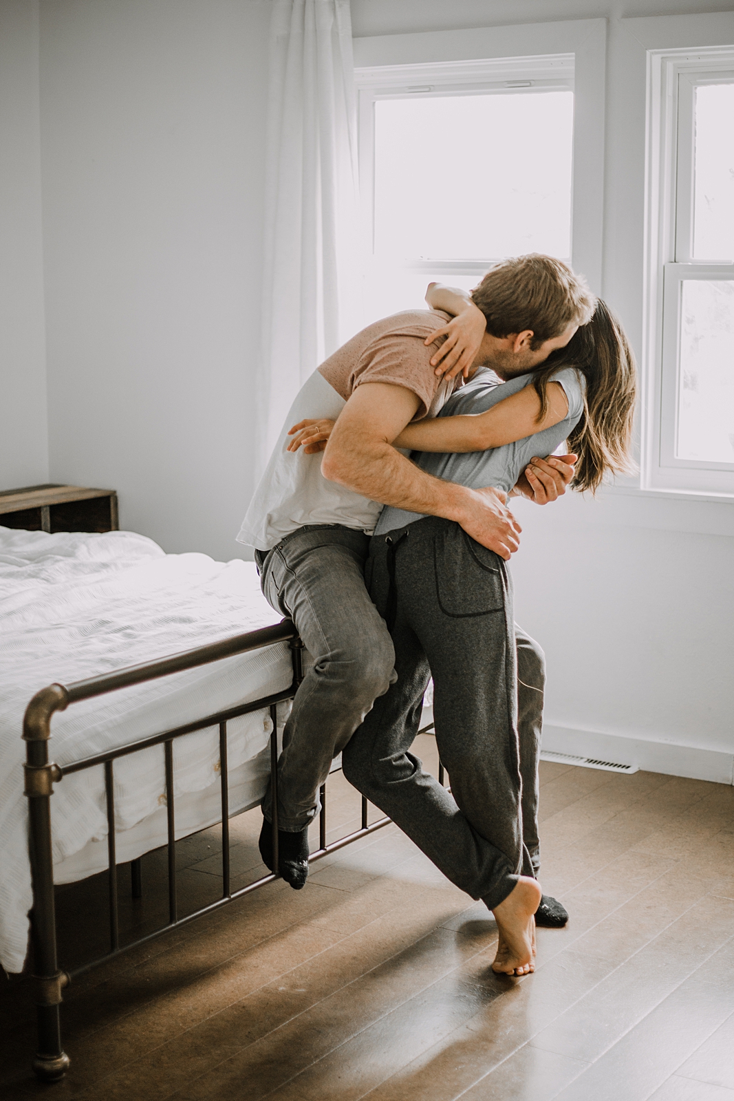 couple snuggling, in home session in boulder colorado, boulder colorado hiking elopement photographer