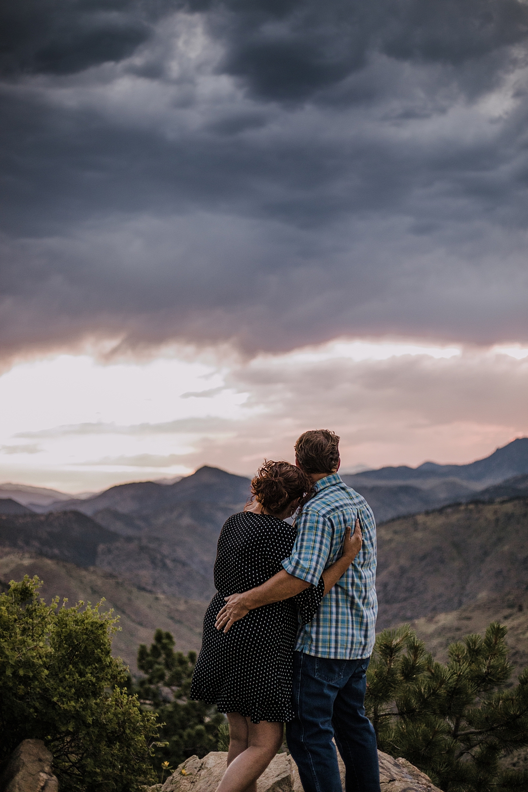 couple taking in the view, sunset on top of lookout mountain near golden colorado, lookout mountain engagements, lookout mountain hiking trails