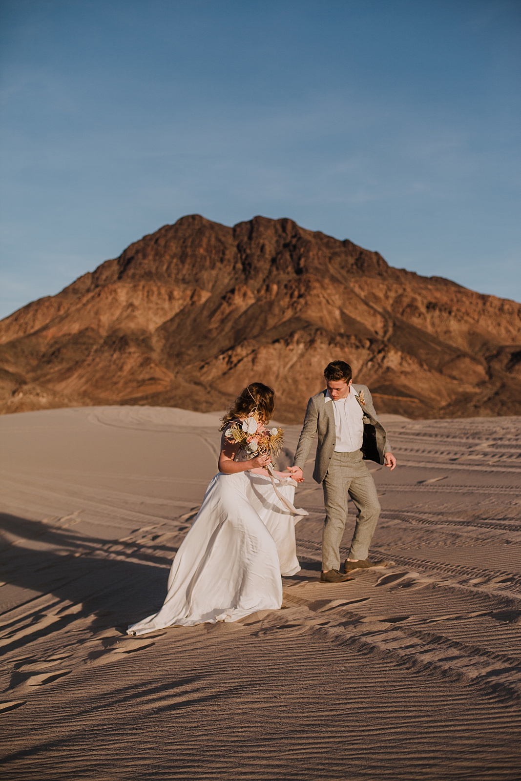 dirtbiking at little dumont dunes, little dumont dunes off roading, little dumont dunes engagements, little dumont dunes elopement, death valley sunset, hiking the dunes in death valley