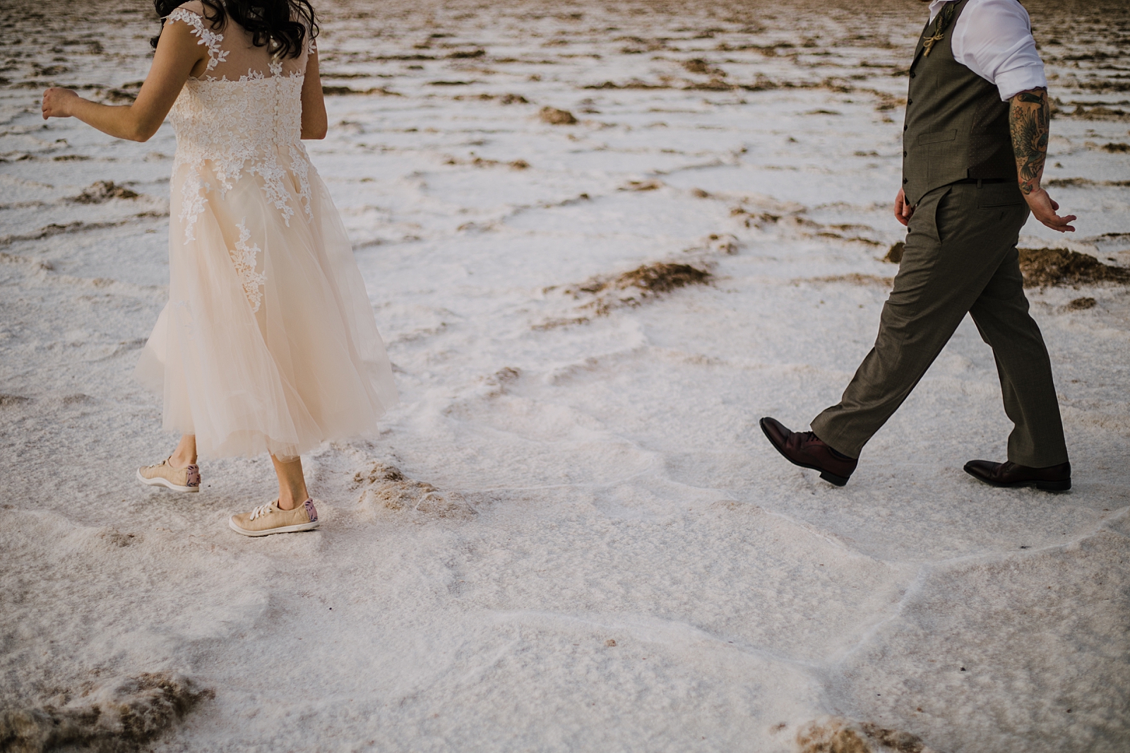 walking on the salt flats, death valley national park elopement, elope in death valley, badwater basin elopement, hiking in death valley national park, sunset at badwater basin