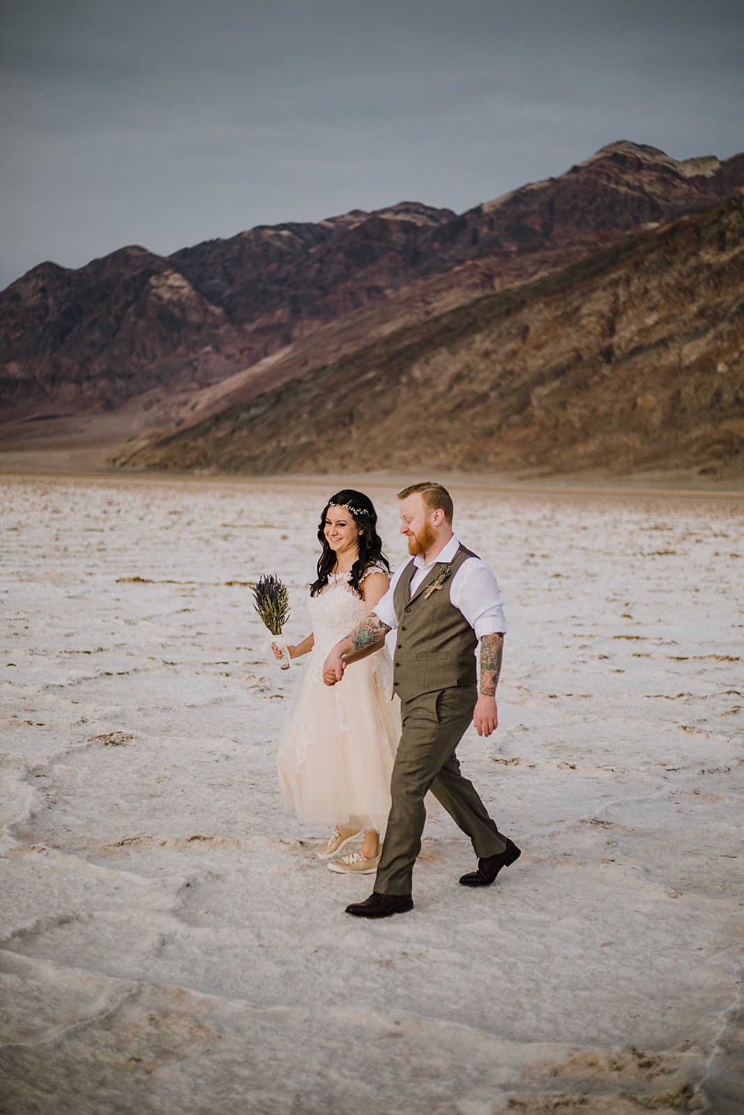 walking on the salt flats, death valley national park elopement, elope in death valley, badwater basin elopement, hiking in death valley national park, sunset at badwater basin