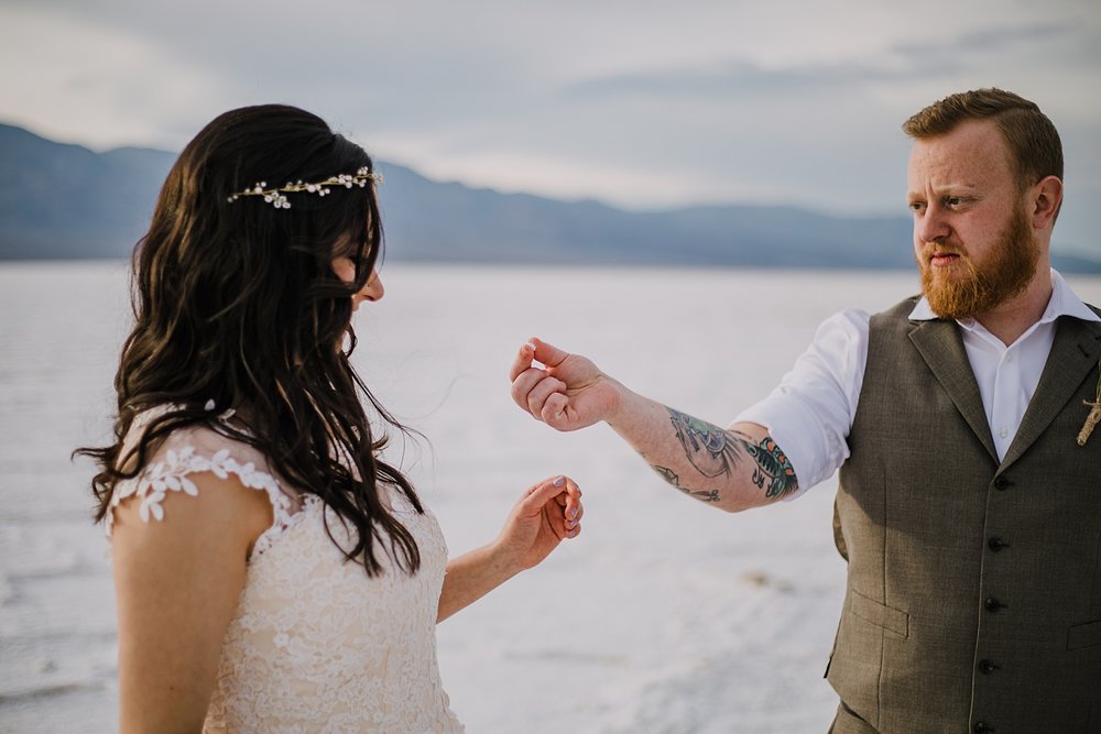 walking on the salt flats, death valley national park elopement, elope in death valley, badwater basin elopement, hiking in death valley national park, sunset at badwater basin