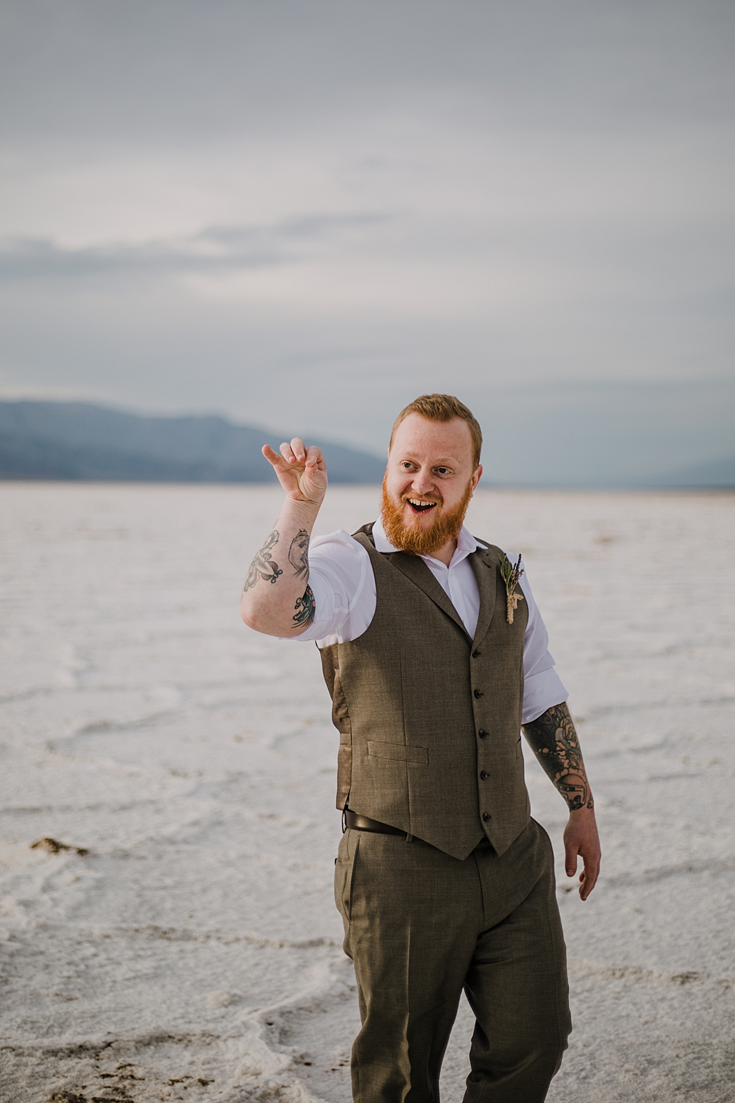 salt bae on the salt flats, death valley national park elopement, elope in death valley, badwater basin elopement, hiking in death valley national park, sunset at badwater basin