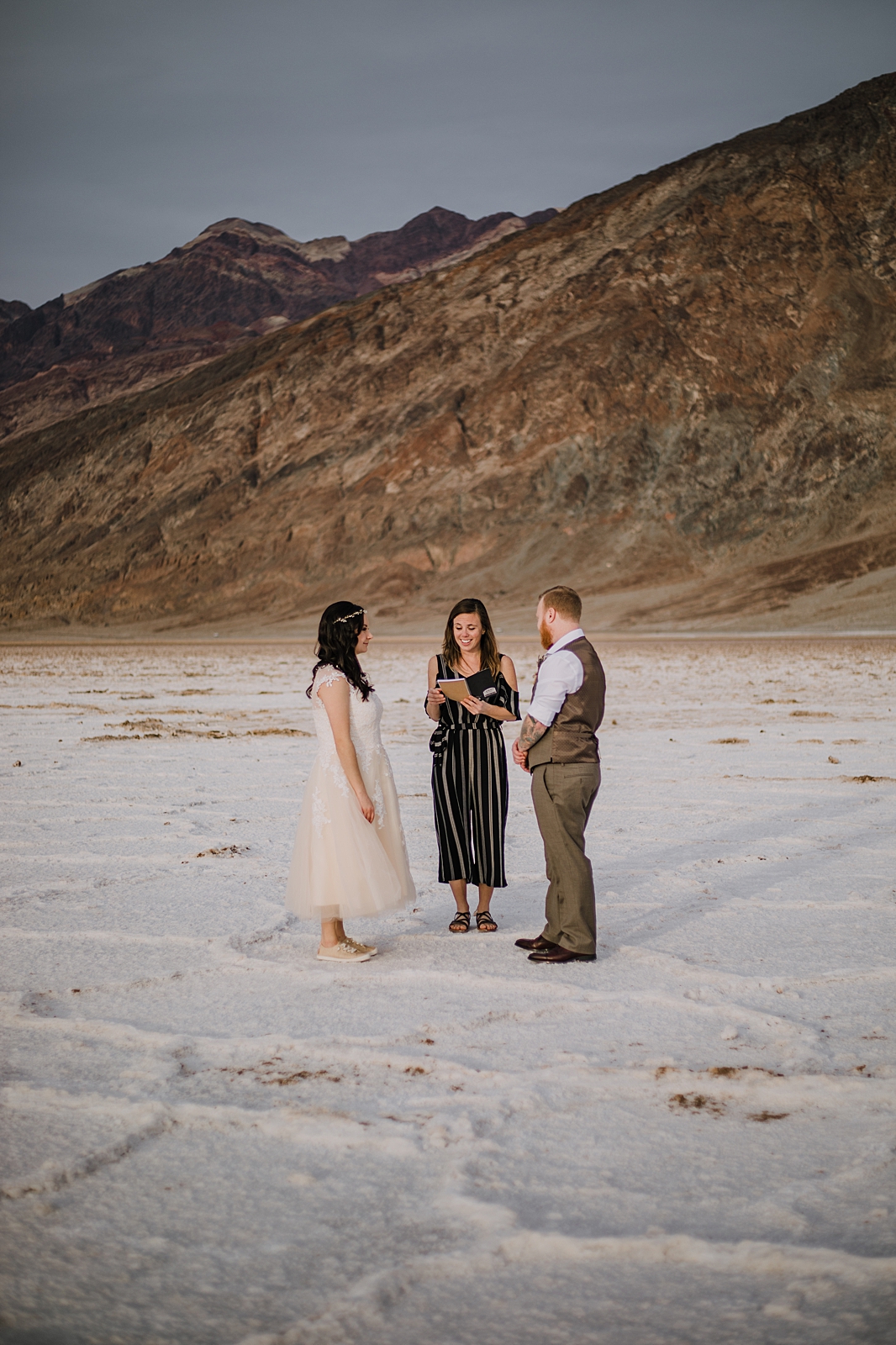 eloping on the salt flats, death valley national park elopement, elope in death valley, badwater basin elopement, hiking in death valley national park, sunset at badwater basin