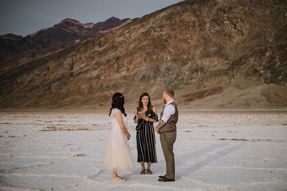 eloping on the salt flats, death valley national park elopement, elope in death valley, badwater basin elopement, hiking in death valley national park, sunset at badwater basin