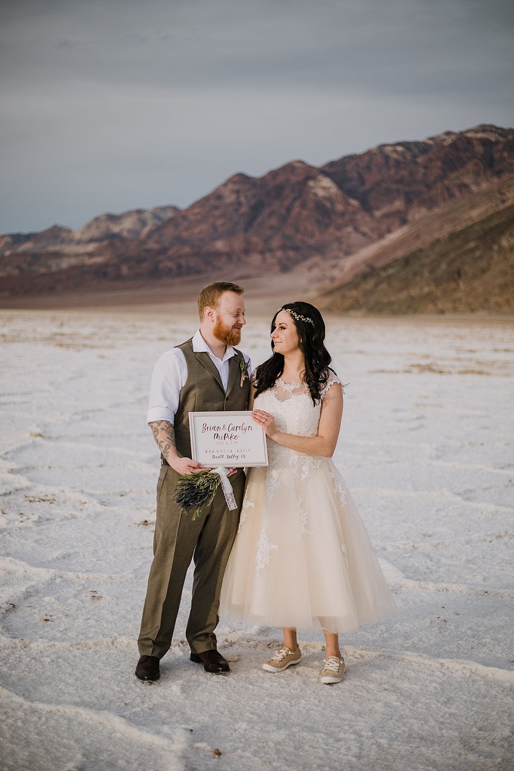 cute elopement sign, death valley national park elopement, elope in death valley, badwater basin elopement, hiking in death valley national park, sunset at badwater basin