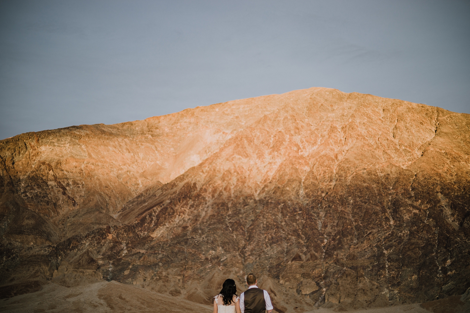 hiking across the salt flats, death valley national park elopement, elope in death valley, badwater basin elopement, hiking in death valley national park, sunset at badwater basin