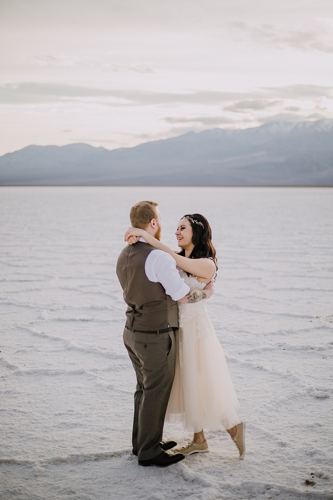 hiking across the salt flats, death valley national park elopement, elope in death valley, badwater basin elopement, hiking in death valley national park, sunset at badwater basin