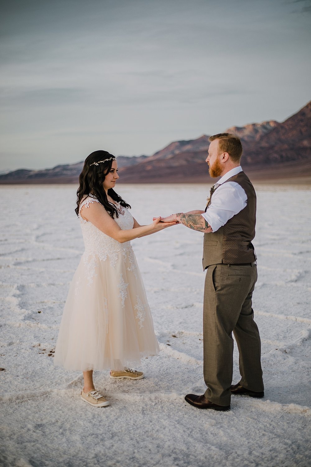 playing on the salt flats, death valley national park elopement, elope in death valley, badwater basin elopement, hiking in death valley national park, sunset at badwater basin