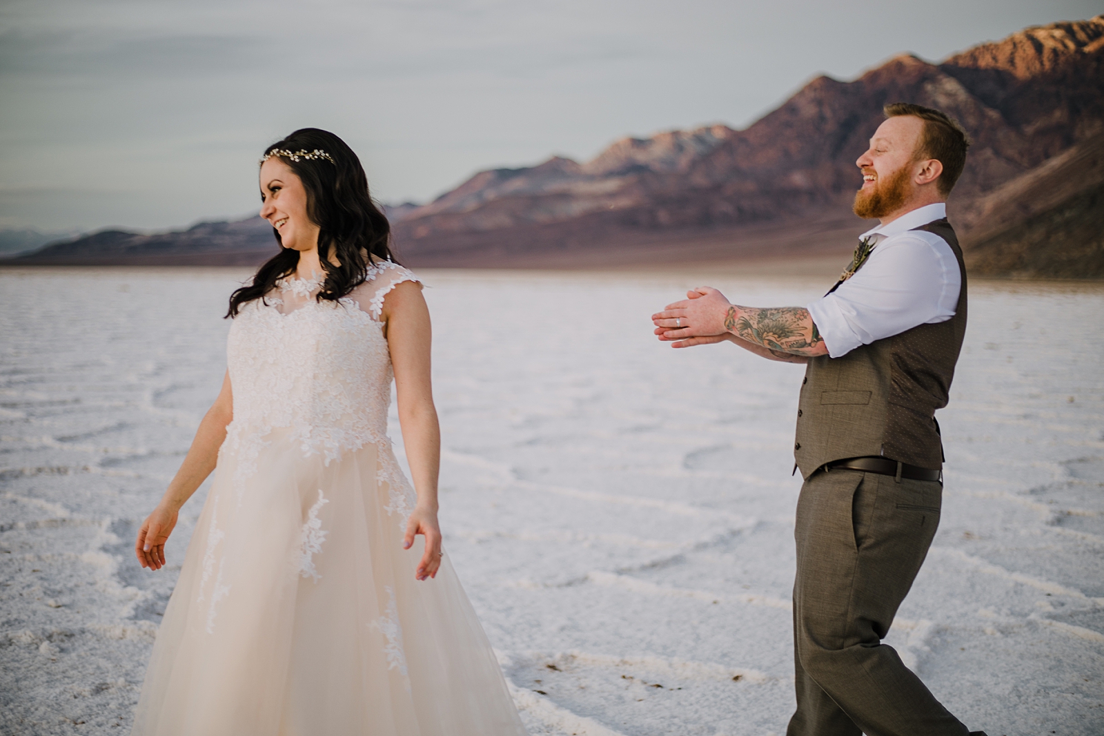 playing on the salt flats, death valley national park elopement, elope in death valley, badwater basin elopement, hiking in death valley national park, sunset at badwater basin