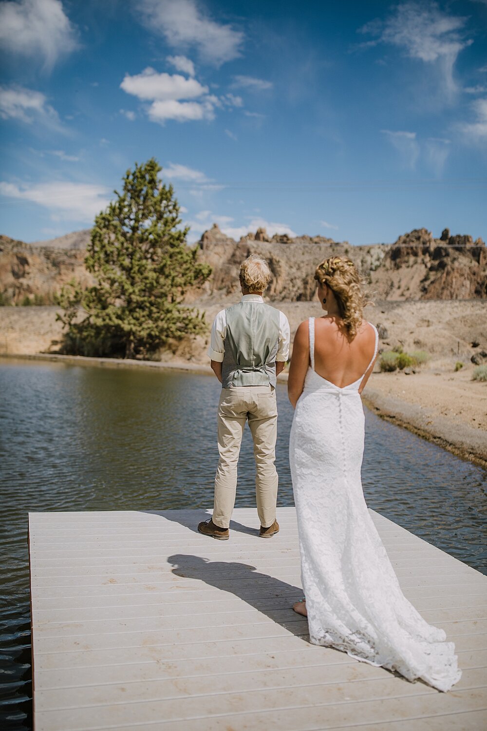 bride and groom on dock of lake for first look, mt hood elopement, mt hood national forest, smith rock state park wedding, smith rock state park hiking elopement, terrebonne oregon backyard wedding