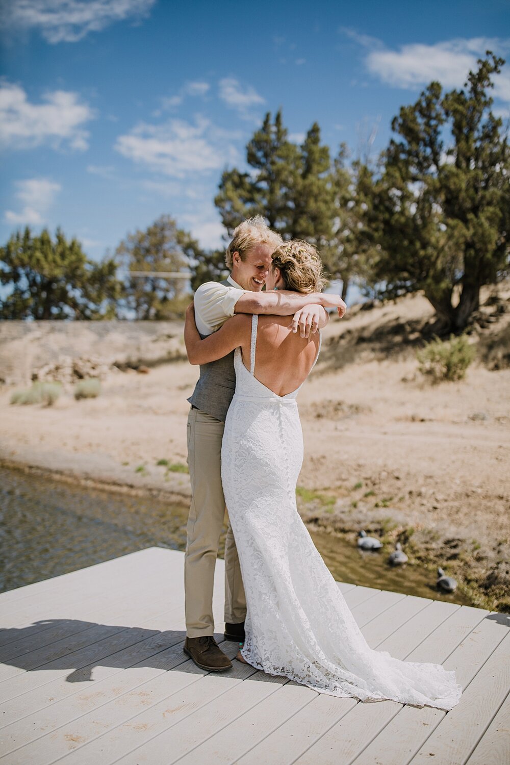 bride and groom on dock of lake for first look, mt hood elopement, mt hood national forest, smith rock state park wedding, smith rock state park hiking elopement, terrebonne oregon backyard wedding