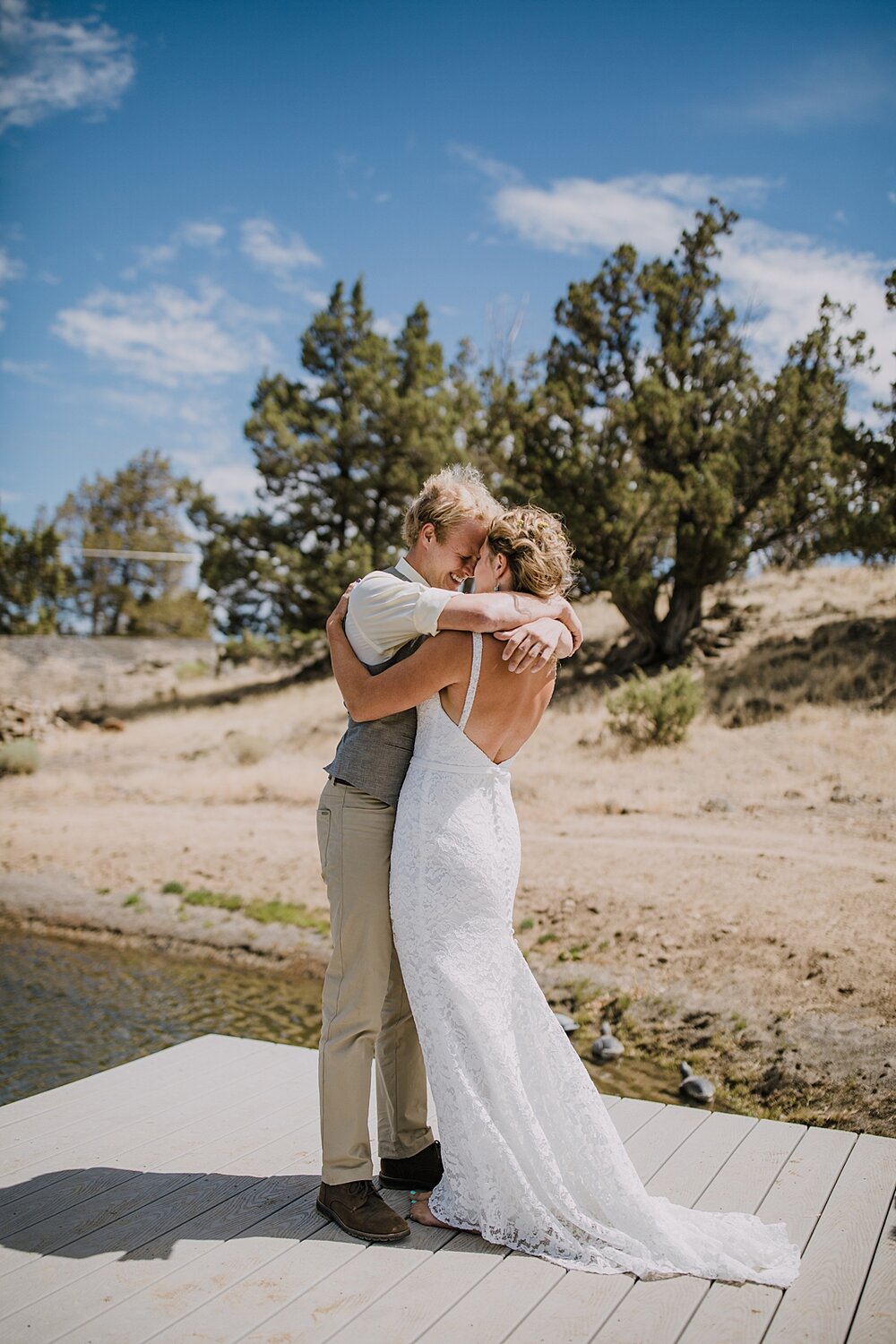 bride and groom on dock of lake for first look, mt hood elopement, mt hood national forest, smith rock state park wedding, smith rock state park hiking elopement, terrebonne oregon backyard wedding