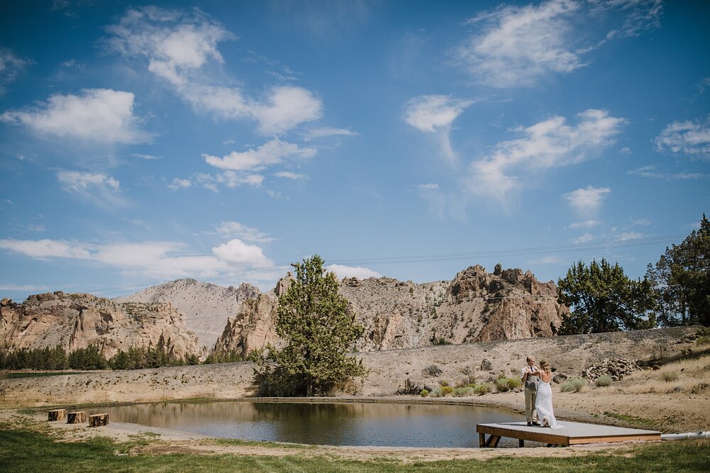 bride and groom first look on lake dock, mt hood elopement, mt hood national forest, smith rock state park wedding, smith rock state park hiking elopement, terrebonne oregon backyard wedding