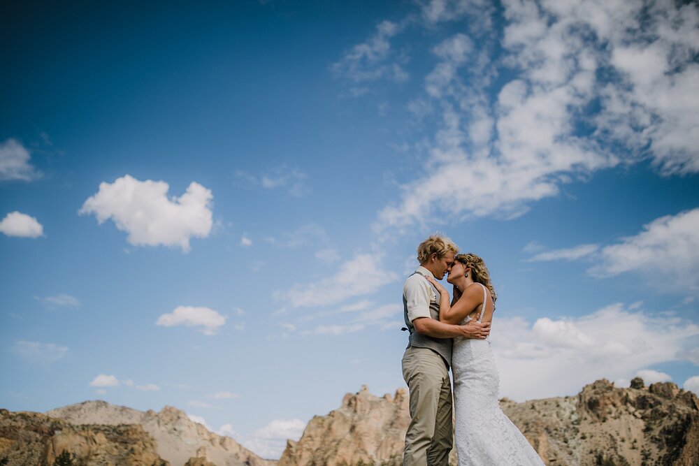 bride and groom kissing at smith rock state park, mt hood elopement, mt hood national forest, smith rock state park wedding, smith rock state park hiking elopement, terrebonne oregon backyard wedding