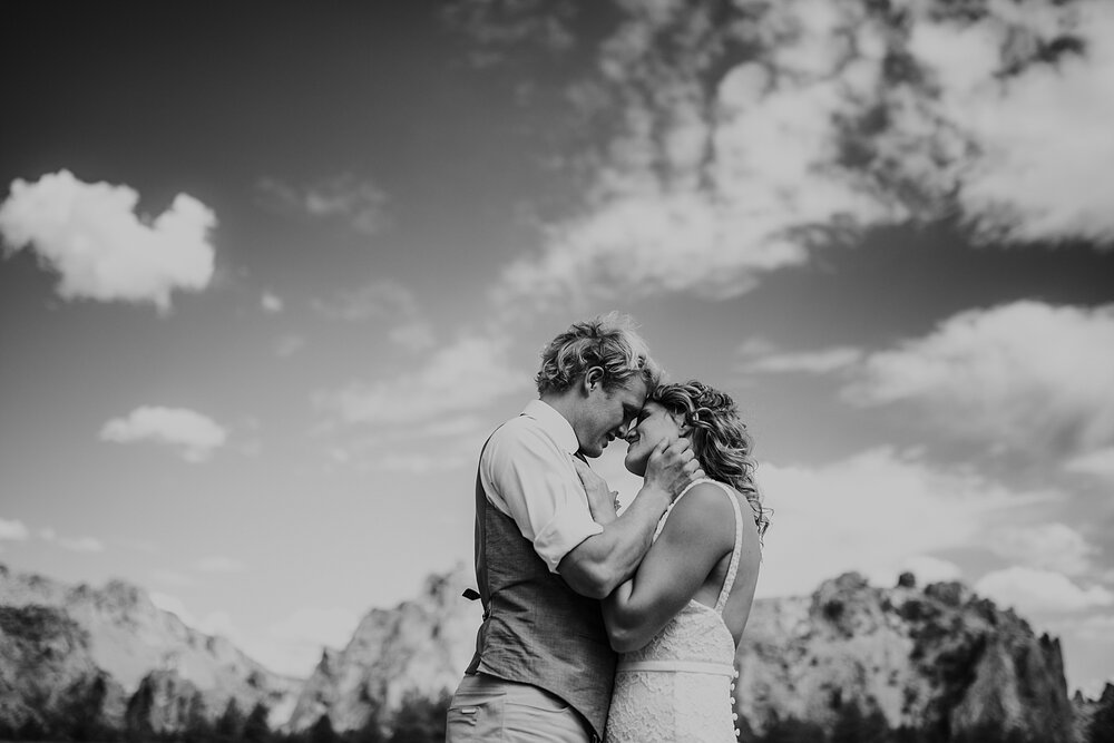 bride and groom kissing at smith rock state park, mt hood elopement, mt hood national forest, smith rock state park wedding, smith rock state park hiking elopement, terrebonne oregon backyard wedding