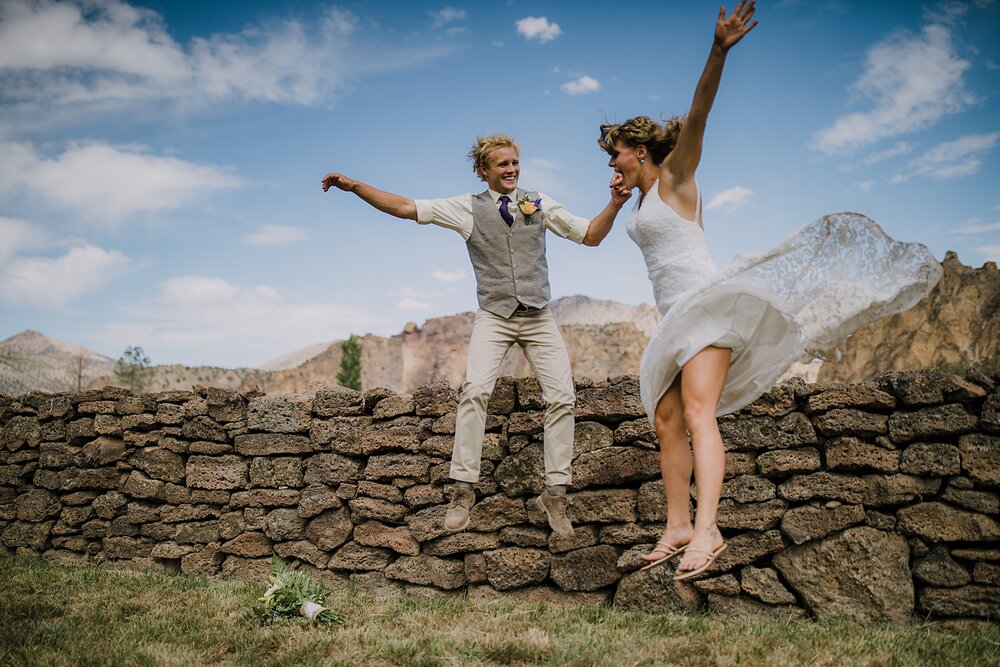 bride and groom jumping at smith rock state park, mt hood elopement, mt hood national forest, smith rock state park wedding, smith rock state park hiking elopement, terrebonne oregon backyard wedding