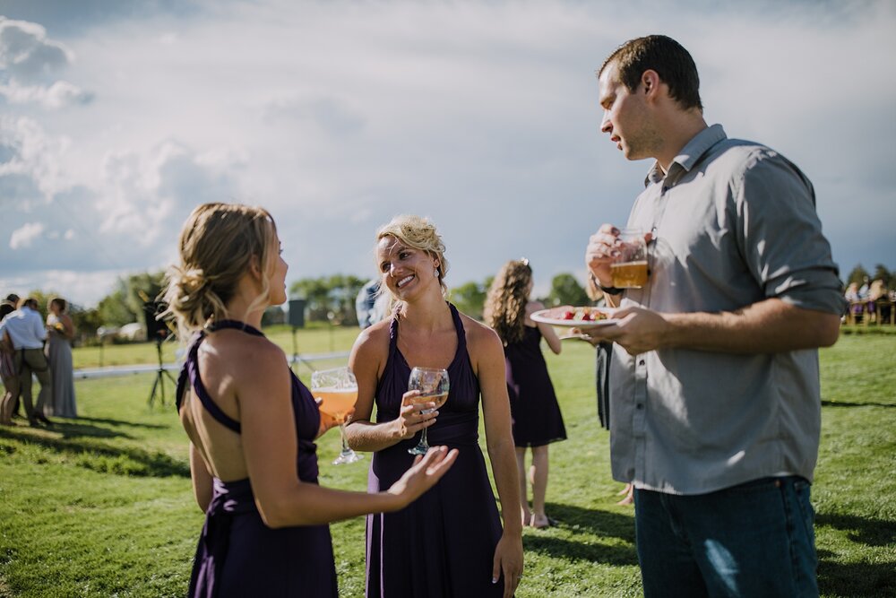 guests mingling cocktail hour at backyard wedding, mt hood elopement, mt hood national forest, smith rock state park wedding, smith rock state park hiking elopement, terrebonne oregon backyard wedding