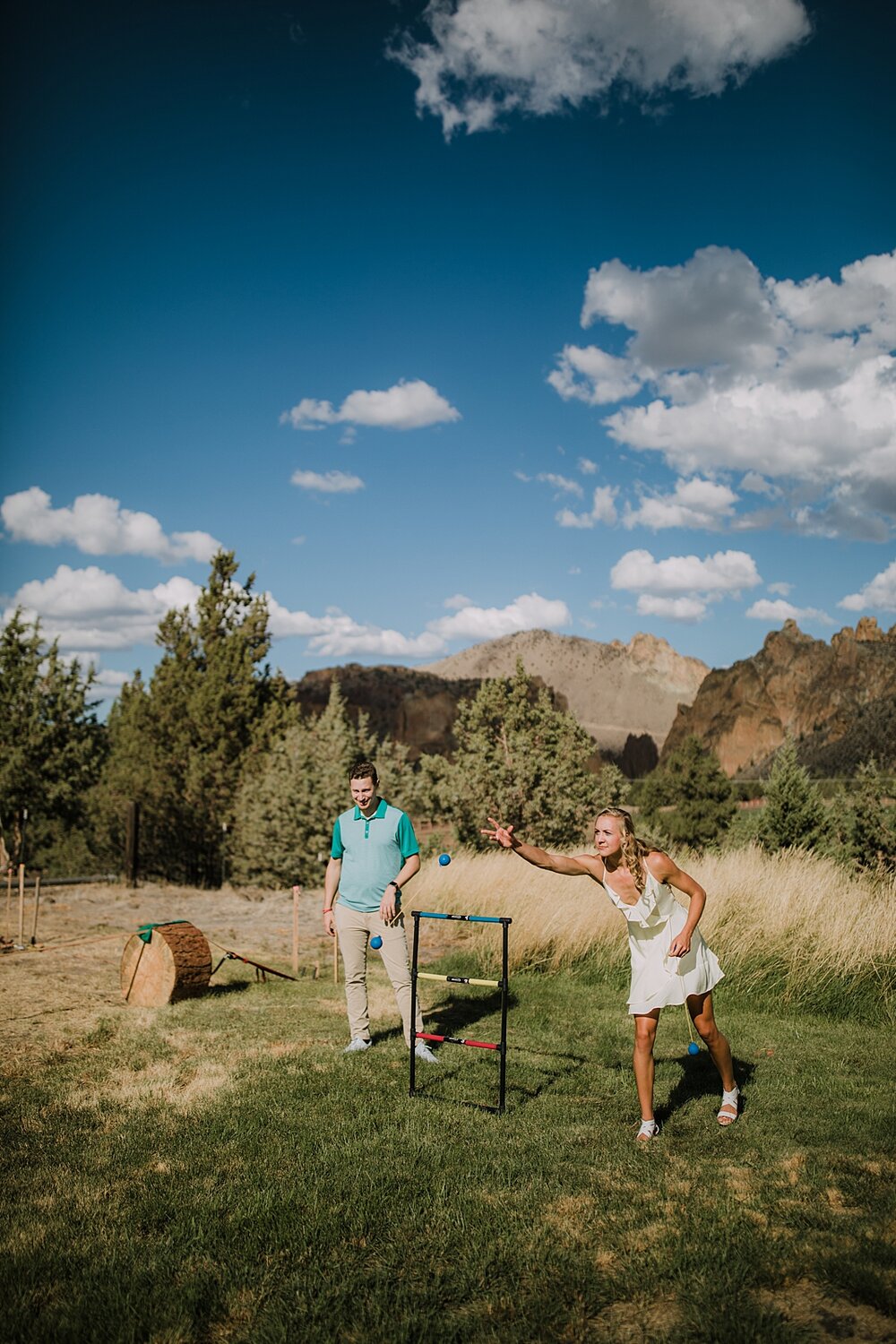 guests playing yard games at backyard wedding, mt hood elopement, mt hood national forest, smith rock state park wedding, smith rock state park hiking elopement, terrebonne oregon backyard wedding