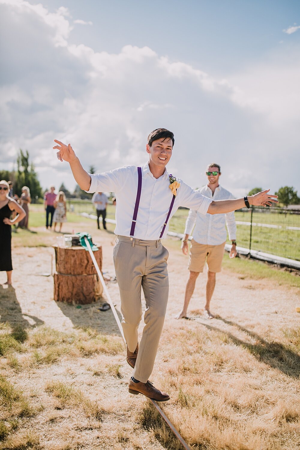 guests slacklining at backyard wedding, mt hood elopement, mt hood national forest, smith rock state park wedding, smith rock state park hiking elopement, terrebonne oregon backyard wedding