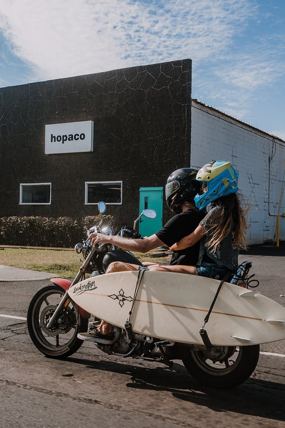 motorcycle with a surfboard attached, couple riding a motorcycle, maui hawaii photographer, maui hawaii surfing, surfing a ho'okipa beach, ho'okipa beach engagements, motorcycle engagements