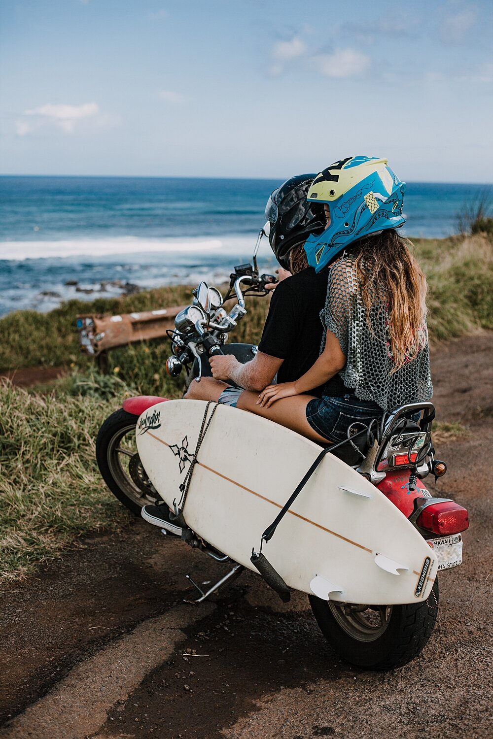 motorcycle driving on the road to hana, couple riding a motorcycle, maui hawaii photographer, maui hawaii surfing, surfing at ho'okipa beach, ho'okipa beach engagements, motorcycle engagements