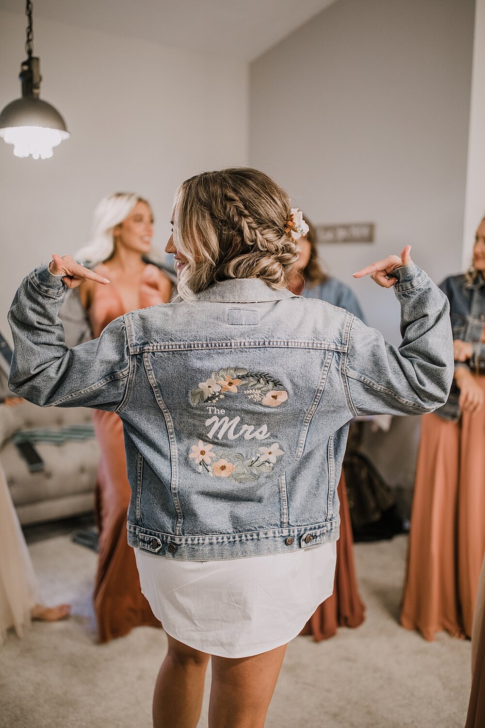 bridesmaids embroidered jean jackets, the barn at sunset ranch in buena vista co, buena vista colorado wedding, the barn at sunset ranch wedding, buena vista colorado wedding venue