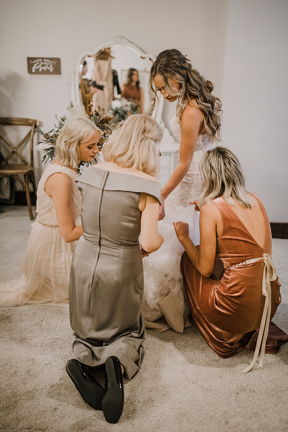 bride putting on dress, the barn at sunset ranch in buena vista co, buena vista colorado wedding, the barn at sunset ranch wedding, buena vista colorado wedding venue