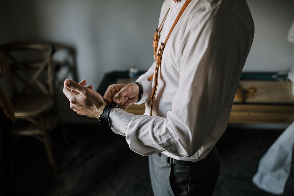 groom getting ready, groom leather suspenders, the barn at sunset ranch in buena vista co, buena vista colorado wedding, the barn at sunset ranch wedding, buena vista colorado wedding venue