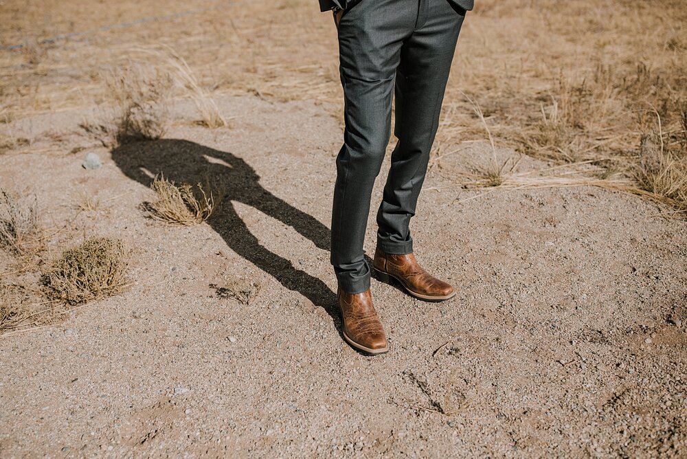 groom getting ready, groom cowboy boots, the barn at sunset ranch in buena vista co, buena vista colorado wedding, the barn at sunset ranch wedding, buena vista colorado wedding venue