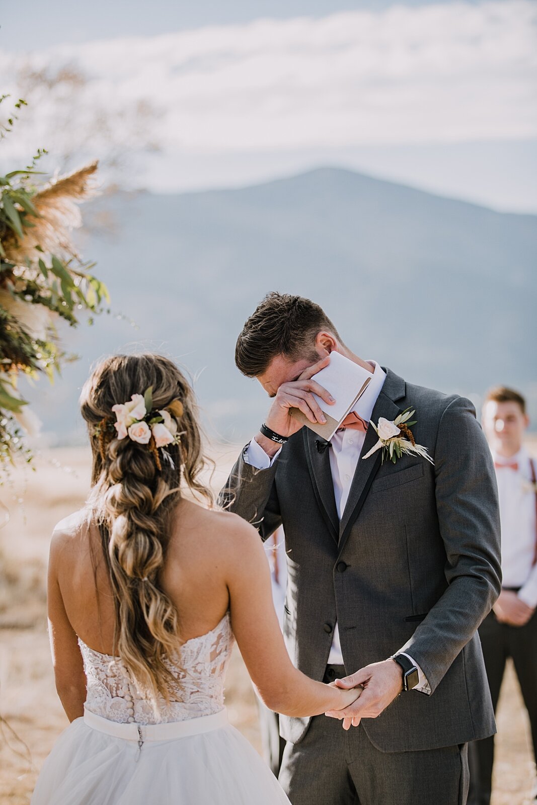 groom crying at alter, bride and groom personal vows, the barn at sunset ranch in buena vista co, buena vista colorado wedding, the barn at sunset ranch wedding, buena vista colorado wedding venue