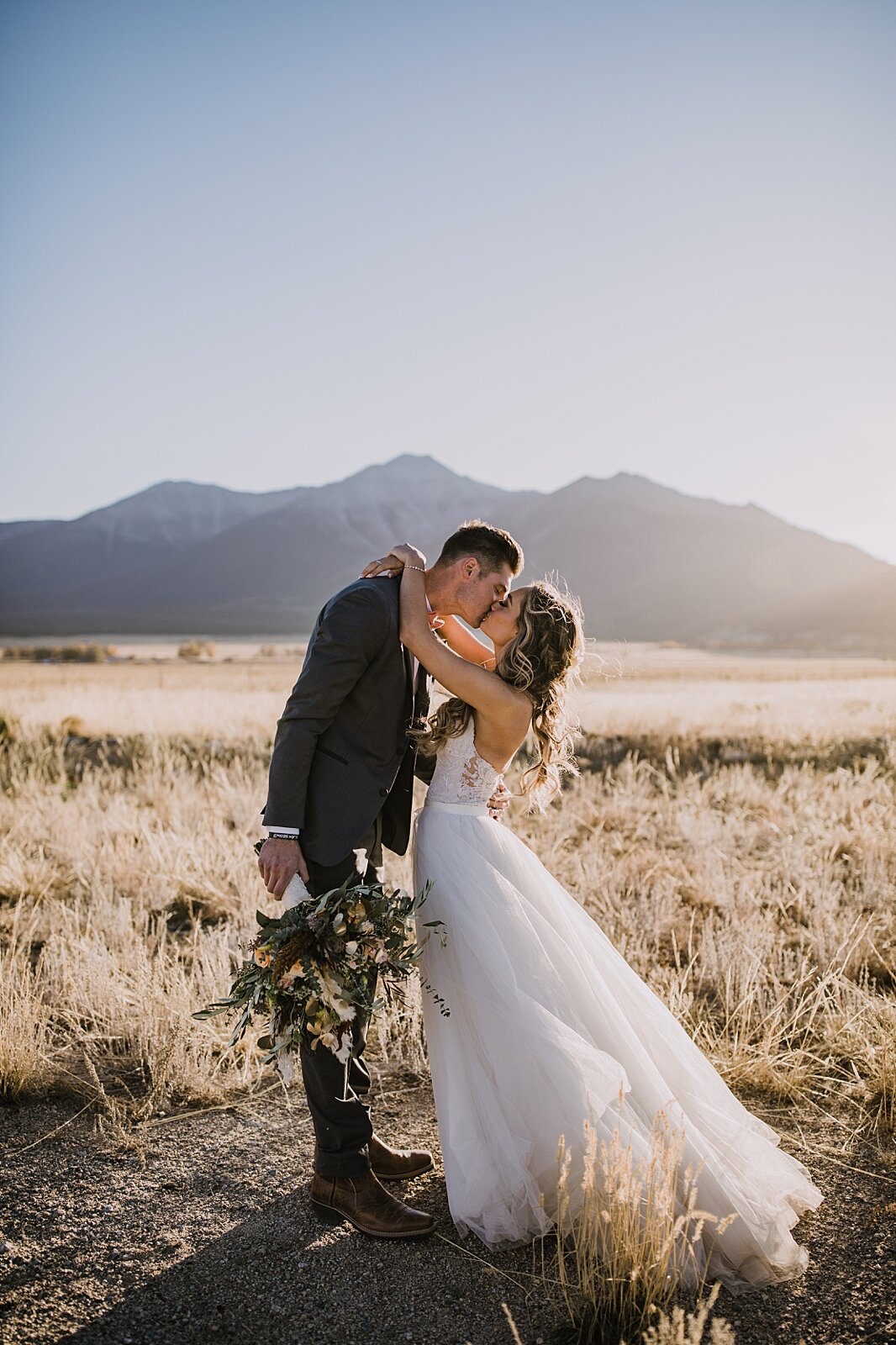 bride and groom hiking, wedding reception, the barn at sunset ranch in buena vista co, buena vista colorado wedding, the barn at sunset ranch wedding, buena vista colorado wood barn wedding venue