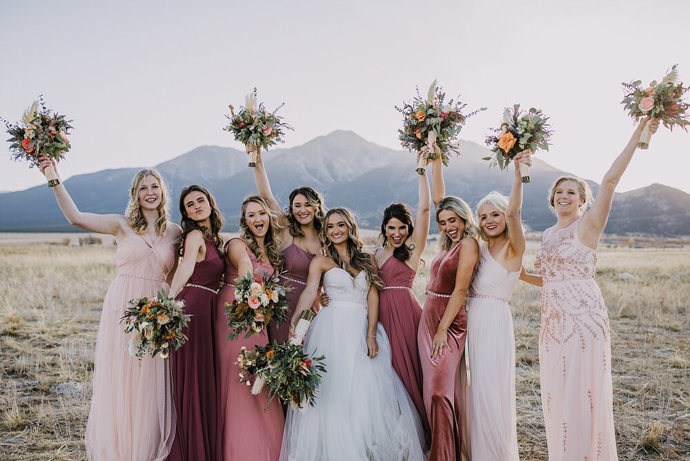 bride and bridesmaids, wedding reception, the barn at sunset ranch in buena vista co, buena vista colorado wedding, the barn at sunset ranch wedding, buena vista colorado wood barn wedding venue