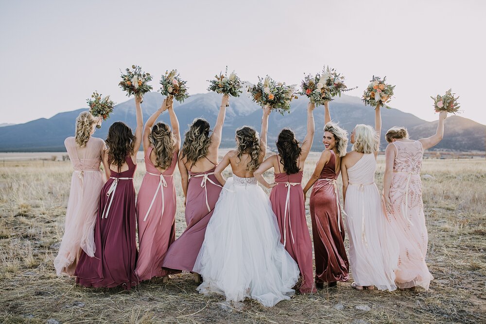 bride and bridesmaids, wedding reception, the barn at sunset ranch in buena vista co, buena vista colorado wedding, the barn at sunset ranch wedding, buena vista colorado mountain wedding venue