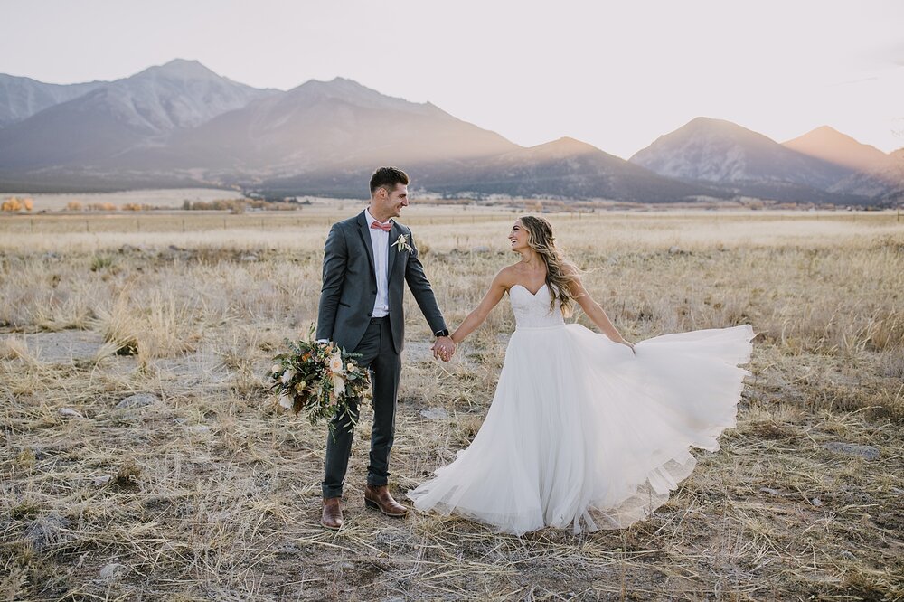 bride and groom at sunset, colorado alpine glow, the barn at sunset ranch in buena vista co, buena vista colorado wedding, the barn at sunset ranch wedding, buena vista colorado barn wedding venue