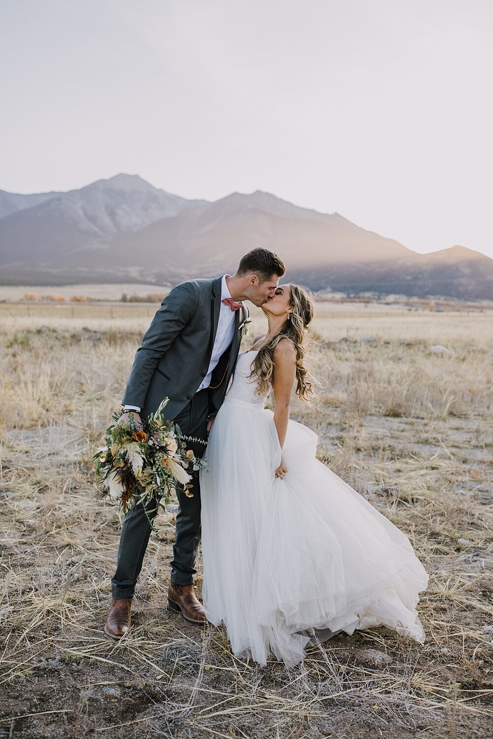 bride and groom at sunset, alpine glow on mt princeton, the barn at sunset ranch in buena vista co, buena vista colorado wedding, the barn at sunset ranch wedding, buena vista colorado wedding venue