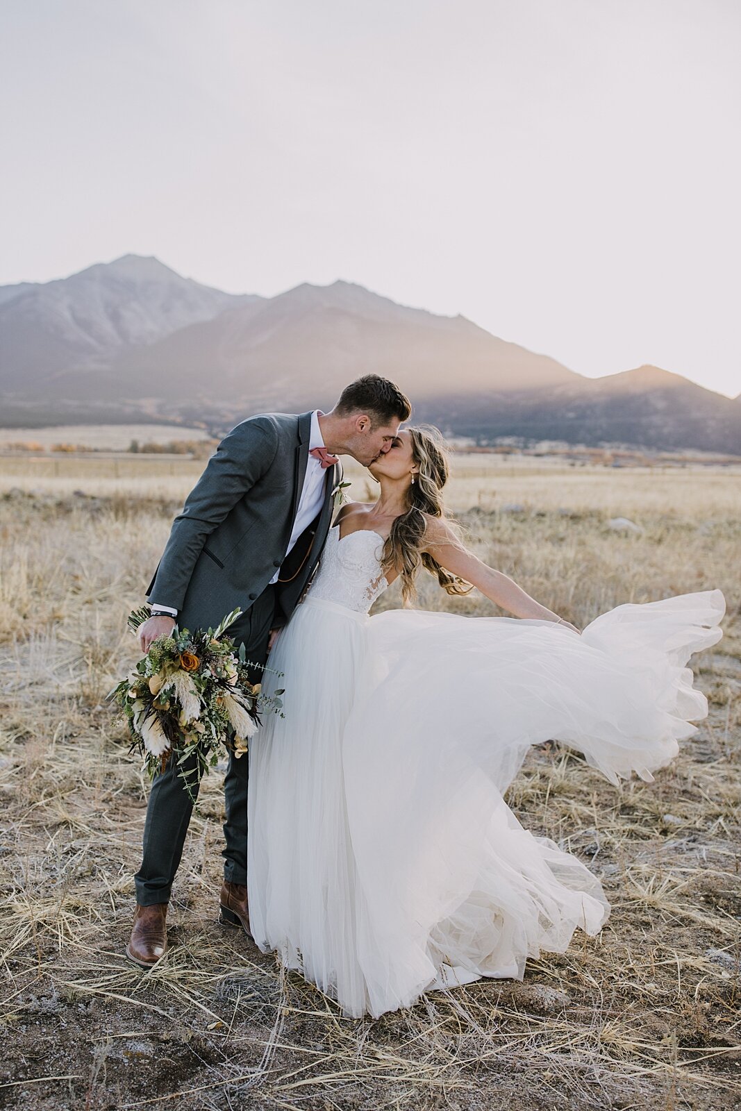bride and groom at sunset, alpine glow on mt princeton, the barn at sunset ranch in buena vista co, buena vista colorado wedding, the barn at sunset ranch wedding, buena vista colorado wedding venue
