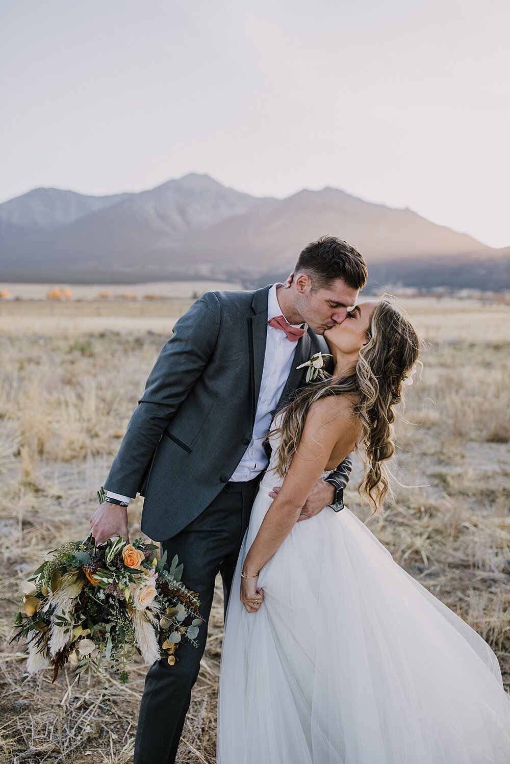 bride and groom at sunset, alpine glow on mt princeton, the barn at sunset ranch in buena vista co, buena vista colorado wedding, the barn at sunset ranch wedding, buena vista colorado wedding venue