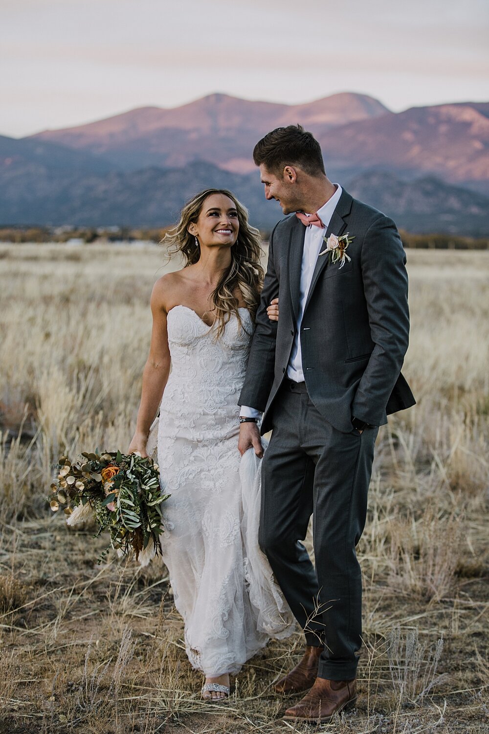 bride and groom walking, alpine glow on mt princeton, the barn at sunset ranch in buena vista co, buena vista colorado wedding, the barn at sunset ranch wedding, buena vista colorado wedding venue