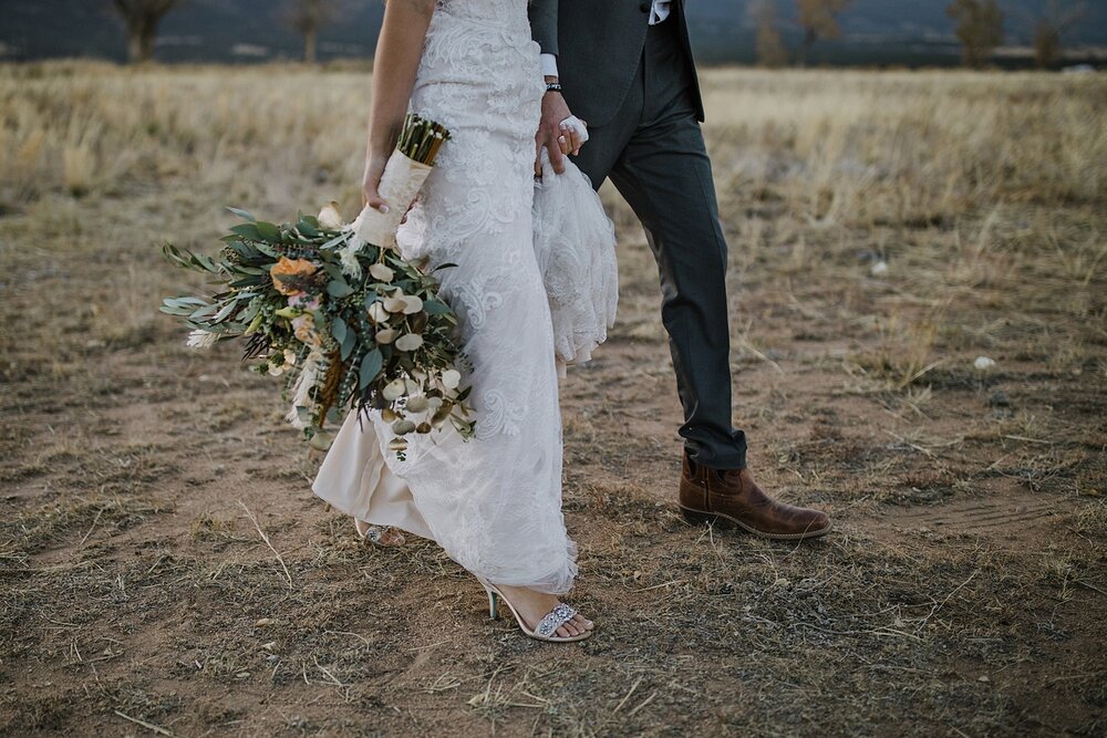 bride and groom walking, alpine glow on mt princeton, the barn at sunset ranch in buena vista co, buena vista colorado wedding, the barn at sunset ranch wedding, buena vista colorado wedding venue