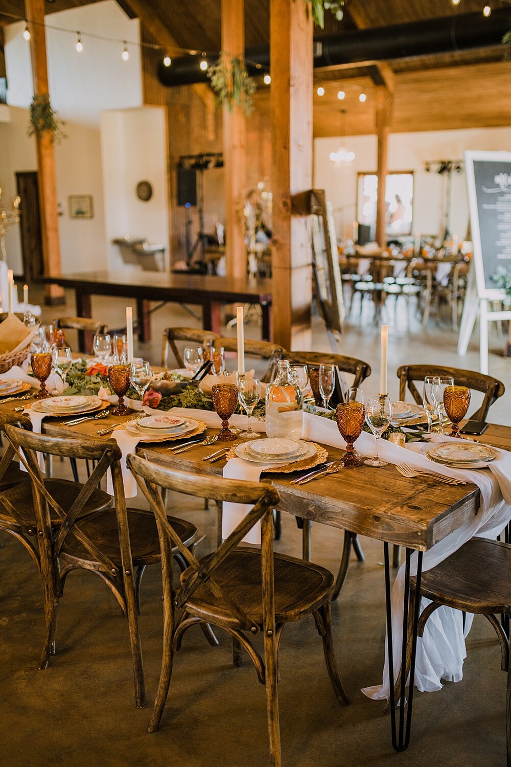 brass and amber rustic wedding decor, wedding tables, the barn at sunset ranch in buena vista co, buena vista colorado wedding, the barn at sunset ranch wedding, buena vista colorado wedding venue