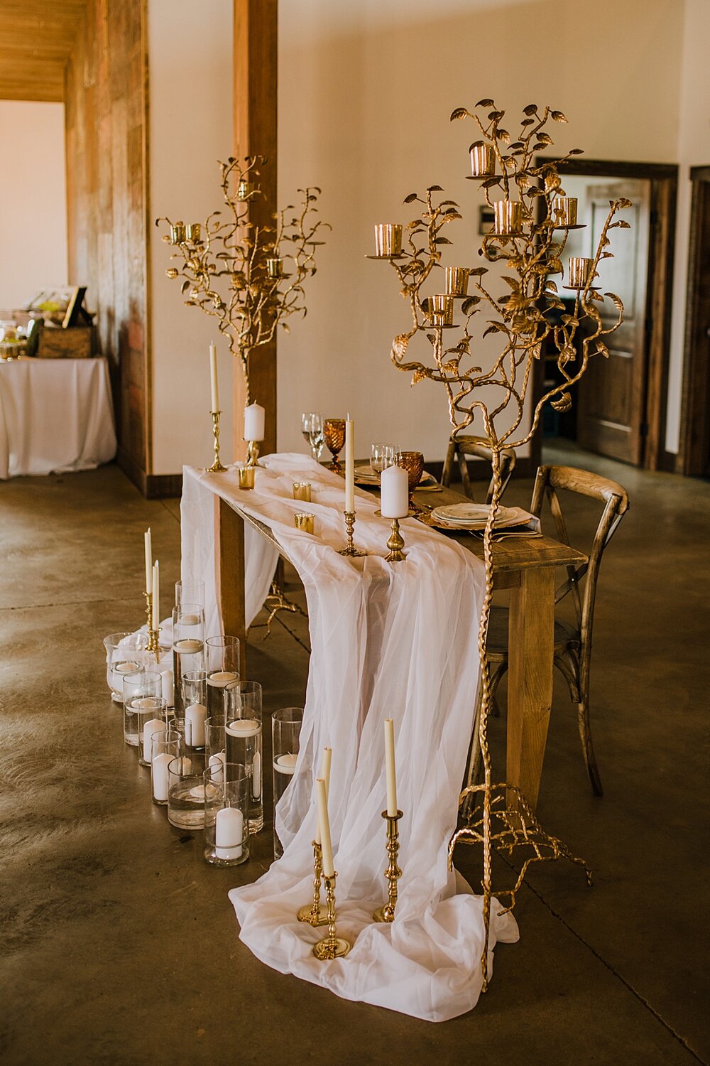 brass wedding decor, wedding dinner tables, the barn at sunset ranch in buena vista co, buena vista colorado wedding, the barn at sunset ranch wedding, buena vista colorado wedding venue