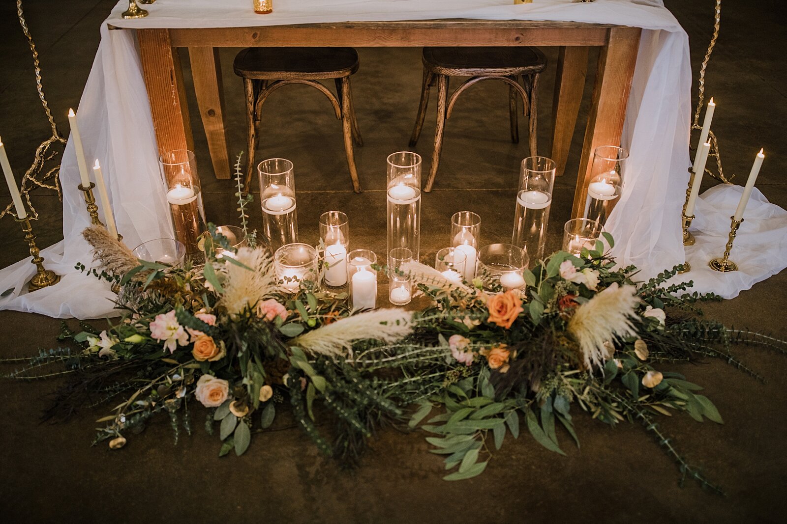 brass and amber rustic wedding decor, wedding tables, the barn at sunset ranch in buena vista co, buena vista colorado wedding, the barn at sunset ranch wedding, buena vista colorado wedding venue