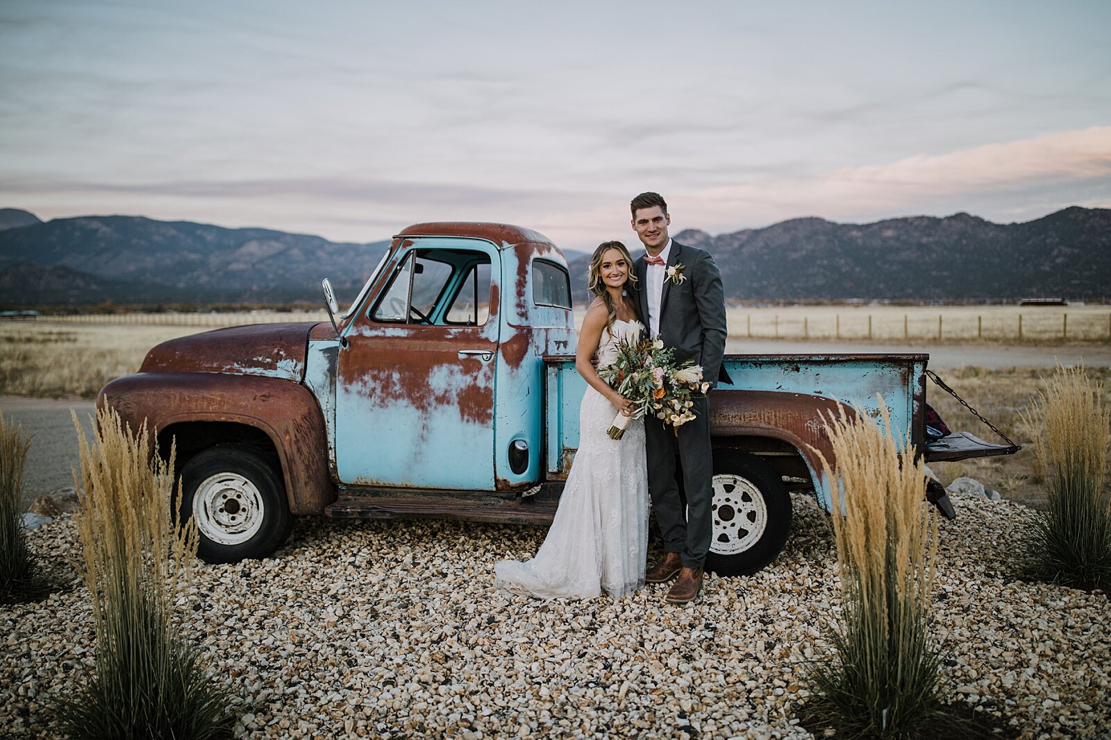 bride and groom with patina old ford truck, the barn at sunset ranch in buena vista co, buena vista colorado wedding, the barn at sunset ranch wedding, buena vista colorado wedding venue