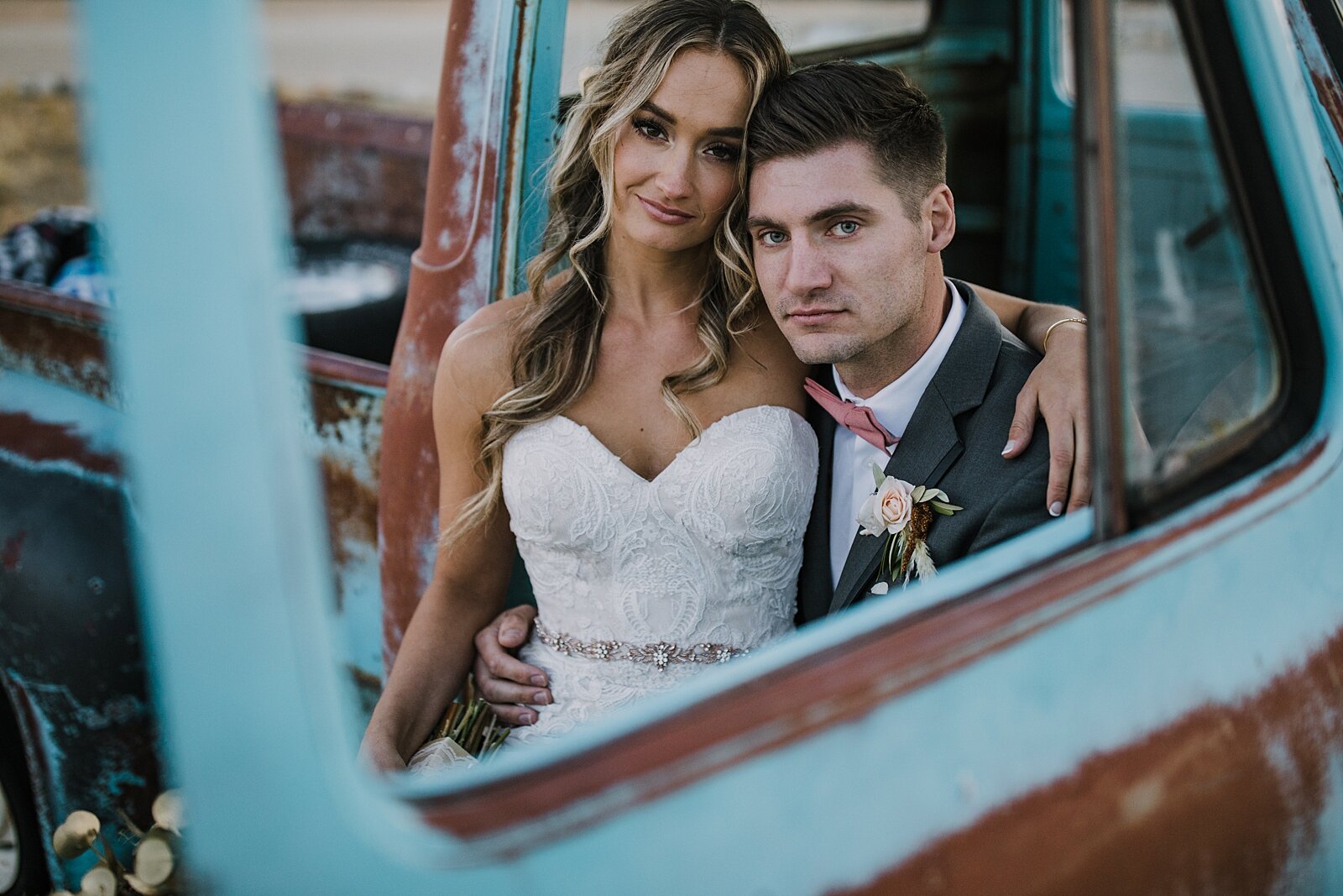 bride and groom in old blue ford truck, the barn at sunset ranch in buena vista co, buena vista colorado wedding, the barn at sunset ranch wedding, buena vista colorado wedding venue
