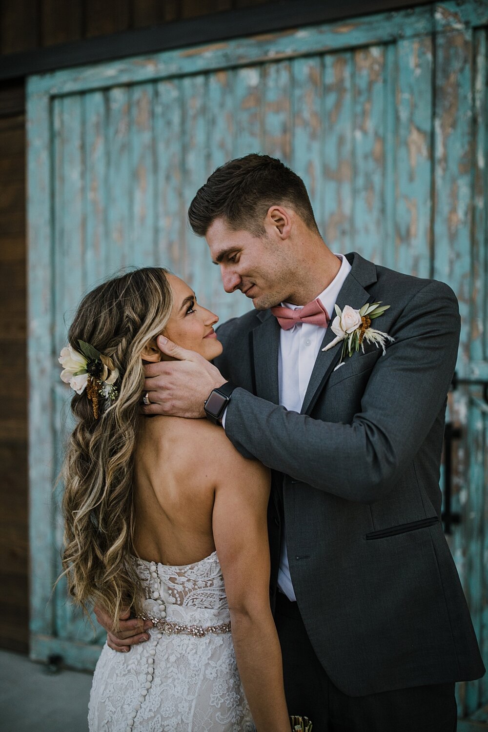 bride and groom in front of barn doors, the barn at sunset ranch in buena vista co, buena vista colorado wedding, the barn at sunset ranch wedding, buena vista colorado wedding venue